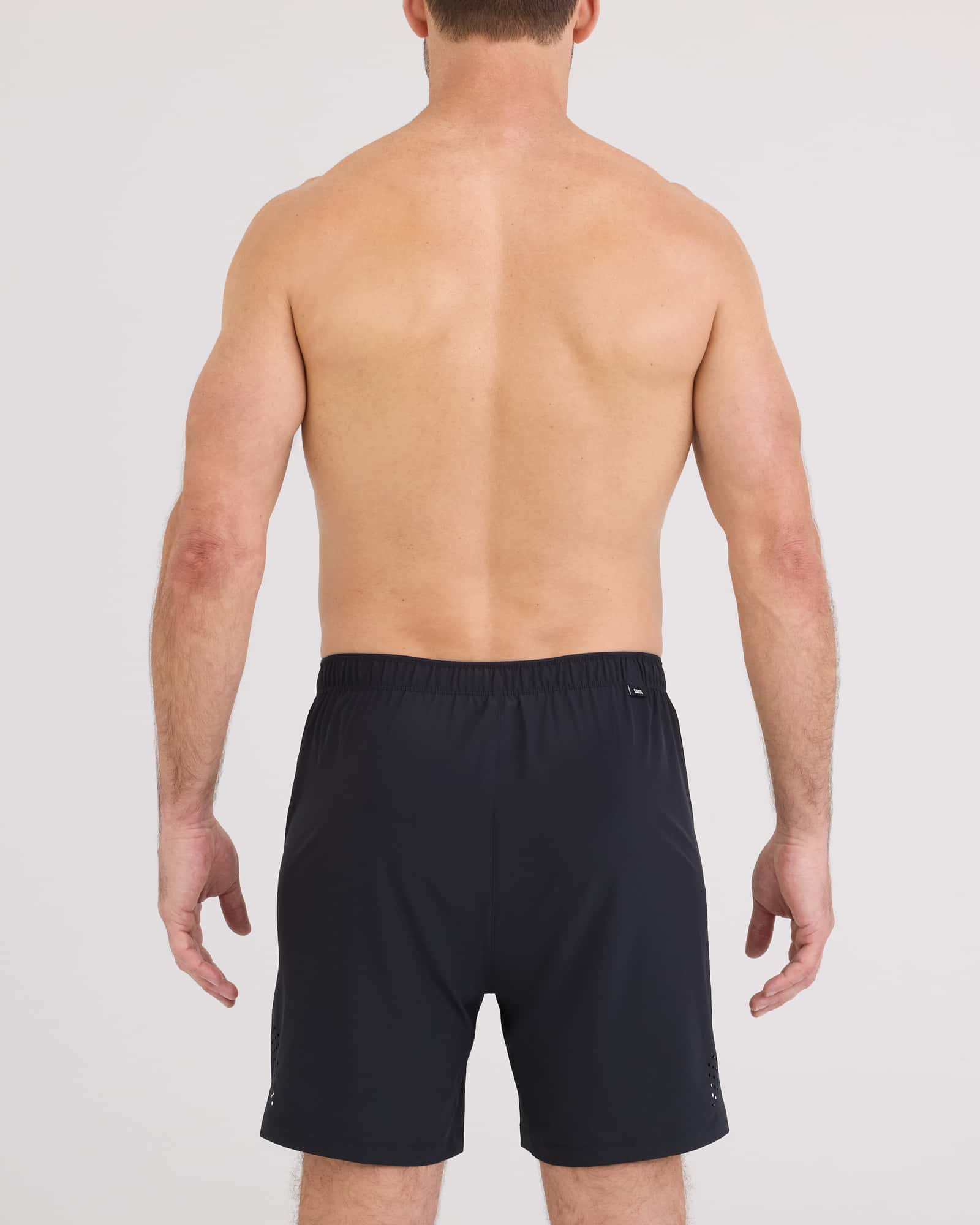 Back - Model wearing Power Moves Short 7" in Black