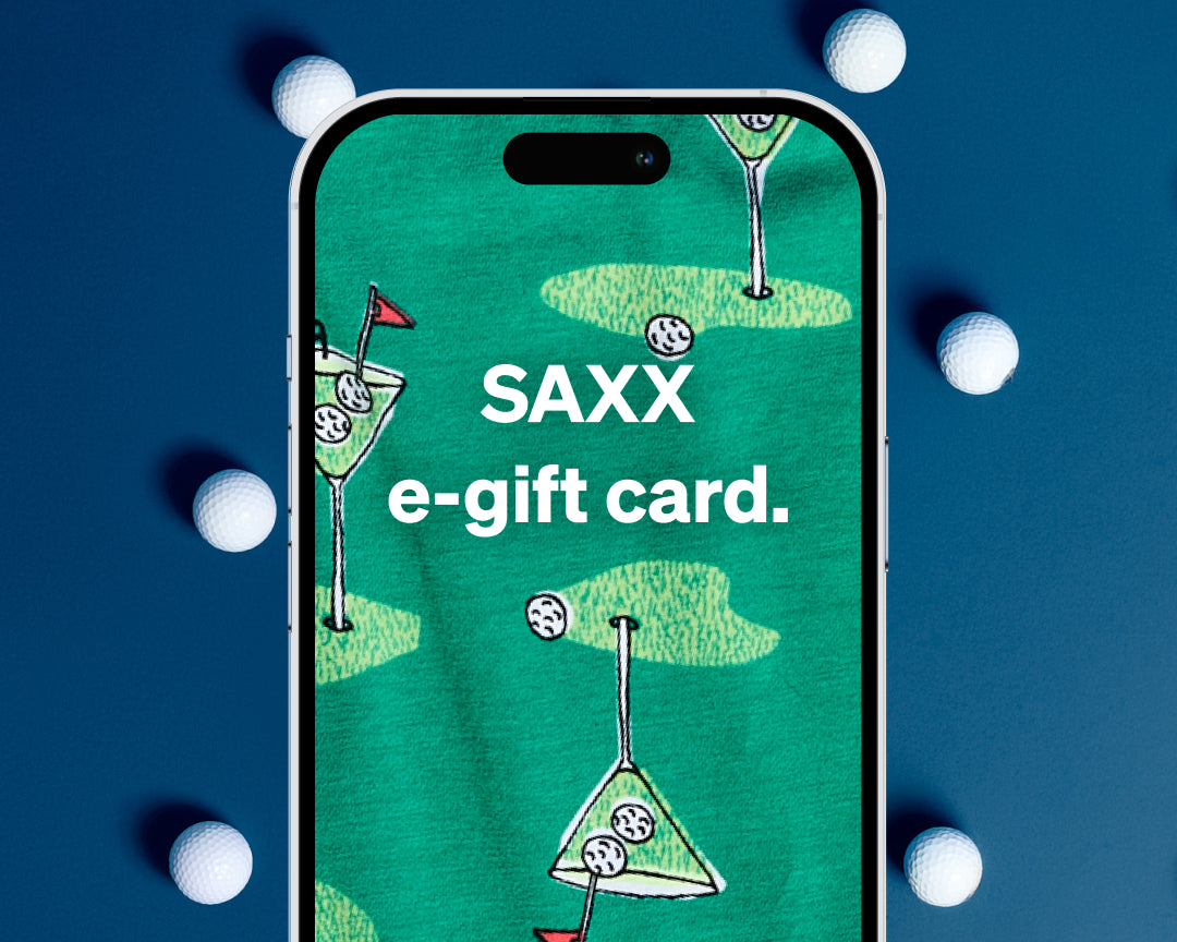 Phone displaying a SAXX e-gift card with golf-themed design on a blue background