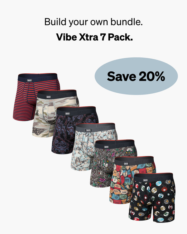 Set of seven pairs of SAXX boxer briefs with various fun patterns on a white background with promo messaging saying "Build your own bundle. Vibe Xtra 7-pack. Save 20%"