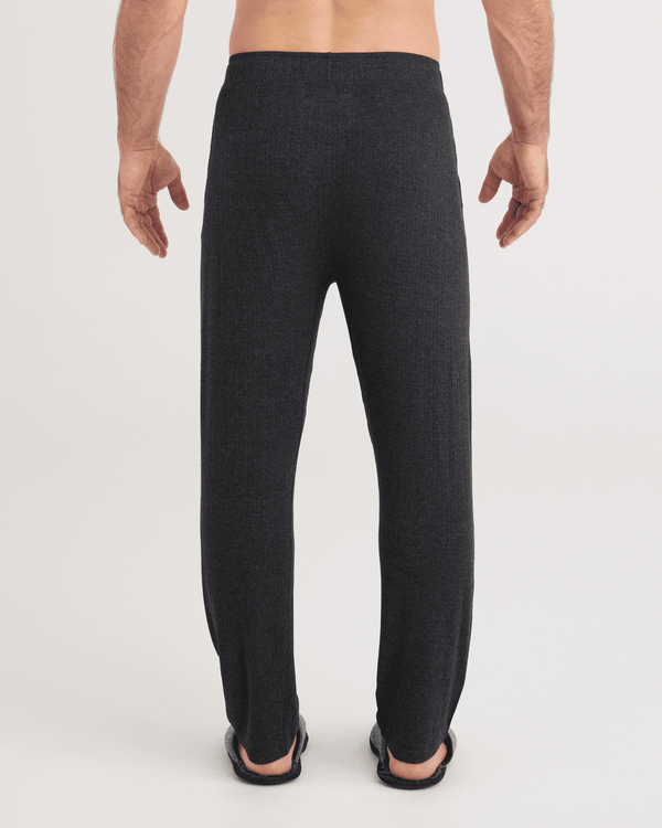Back - Model wearing Snooze Cabin Luxe Pants in Washed Black Heather