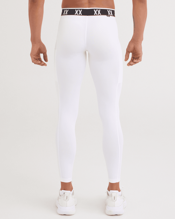Back - Model wearing Multi-Sport Mesh Tights in White