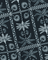 Black fabric with white palm tree and geometric pattern