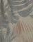 Close-up of a fabric with tropical leaf pattern in earthy tones.