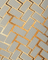 Pattern of interlocking bricks with a herringbone design on a textured surface.