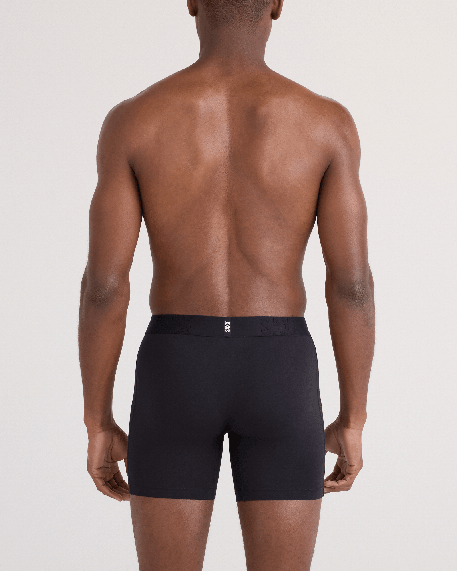 Back - Model wearing  DropTemp Cooling Cotton Boxer Brief Fly 3 Pack in Black