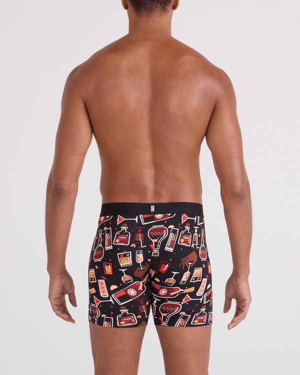 Back - Model wearing  DropTemp Cooling Cotton Boxer Brief Fly in Host With The Most-Black