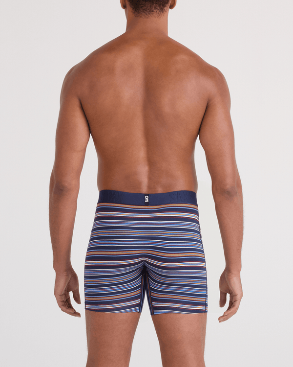 Back - Model wearing  DropTemp Cooling Cotton Boxer Brief Fly in Vivid Stripe-Maritime