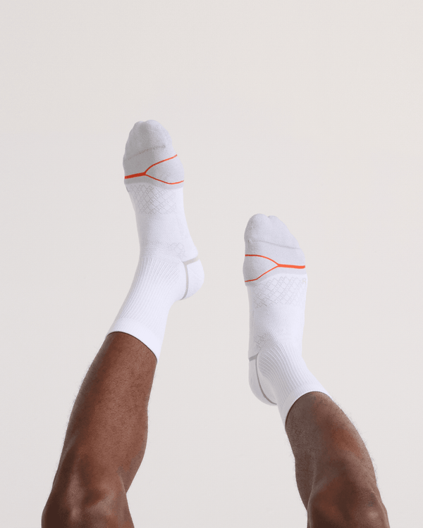 Back - Model wearing  Foot Hold Mid-Weight Crew Sock in White