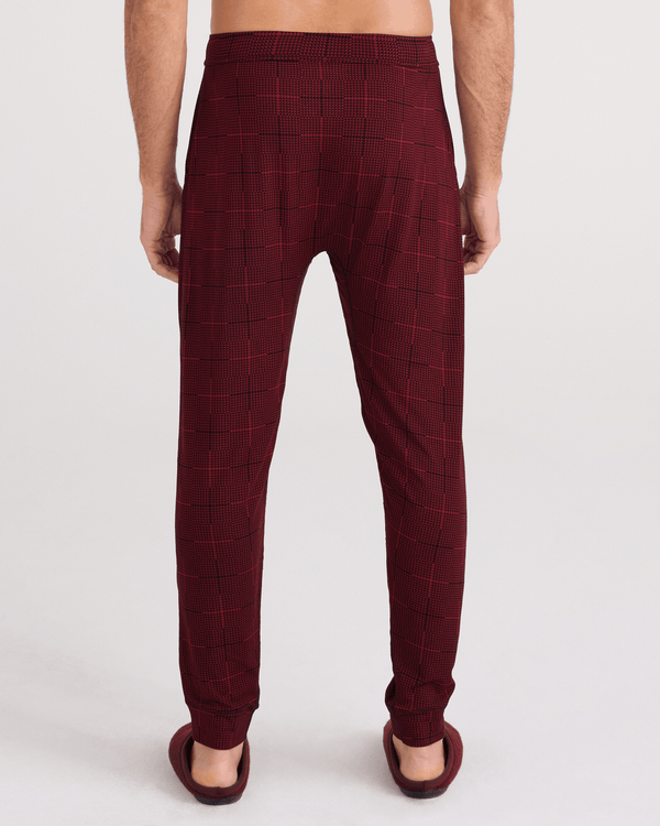 Back - Model wearing  Snooze Sleep Pant in Rad Plaid-Cabernet