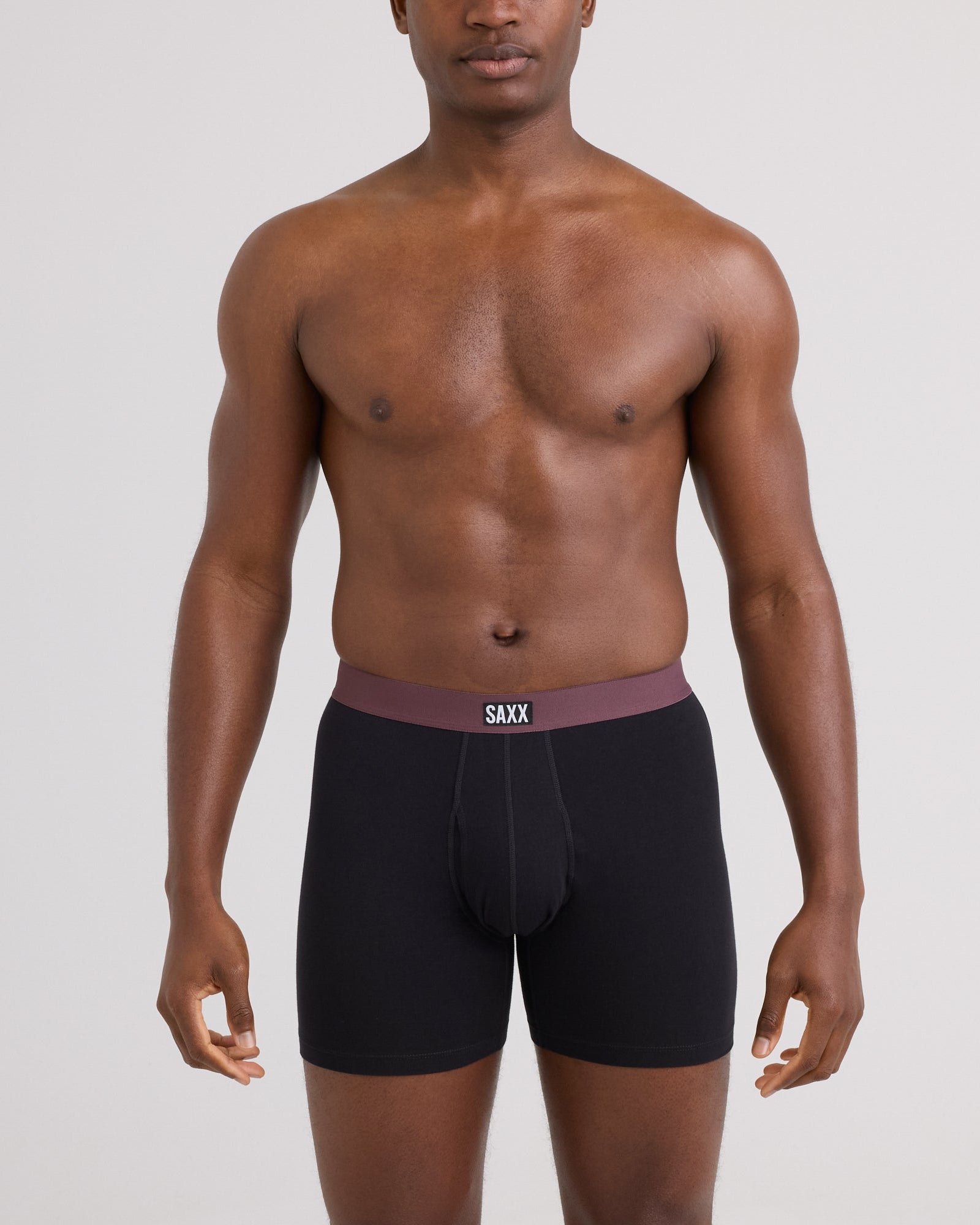 Front - Model wearing Non-Stop Stretch Cotton Boxer Brief 3 Pack in Black/Multi Waistband