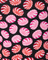 Pattern of pink and red swirled candies on a black background