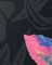Close-up of a black fabric with a colorful abstract pattern on a dark background